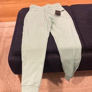 NVGTN size medium teal joggers new with tag